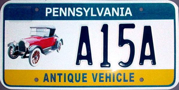 A pennsylvania antique vehicle license plate with an old car.